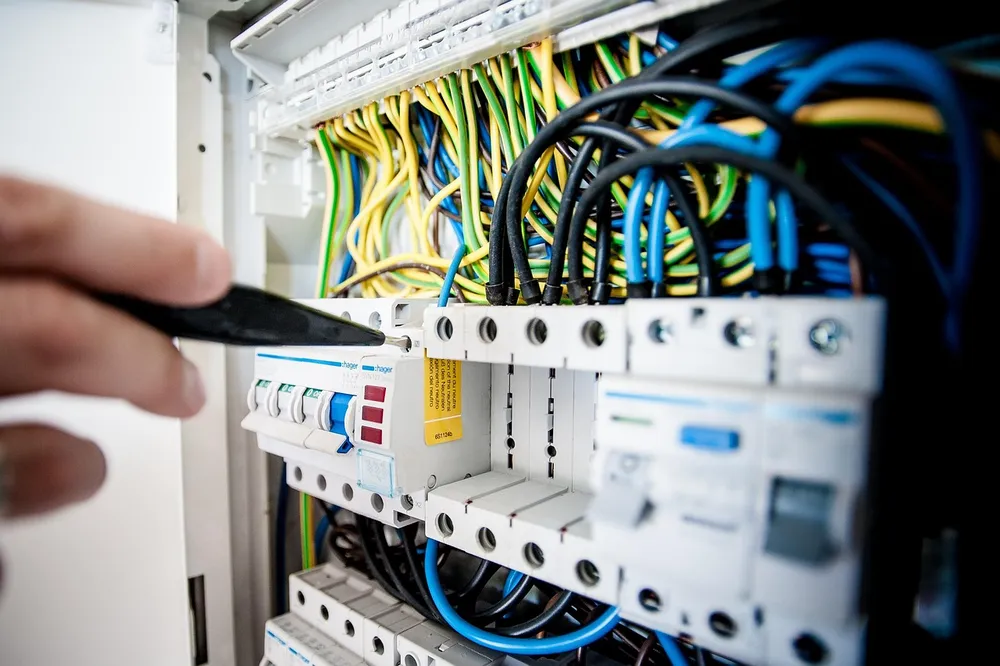 Close-up of a modern electrical breaker panel with neatly organized circuits and wiring