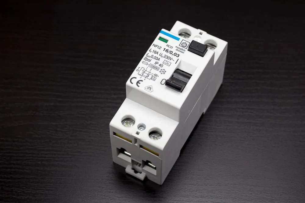Panel-mounted protective device like a whole-home surge protector that installs in the main electrical panel